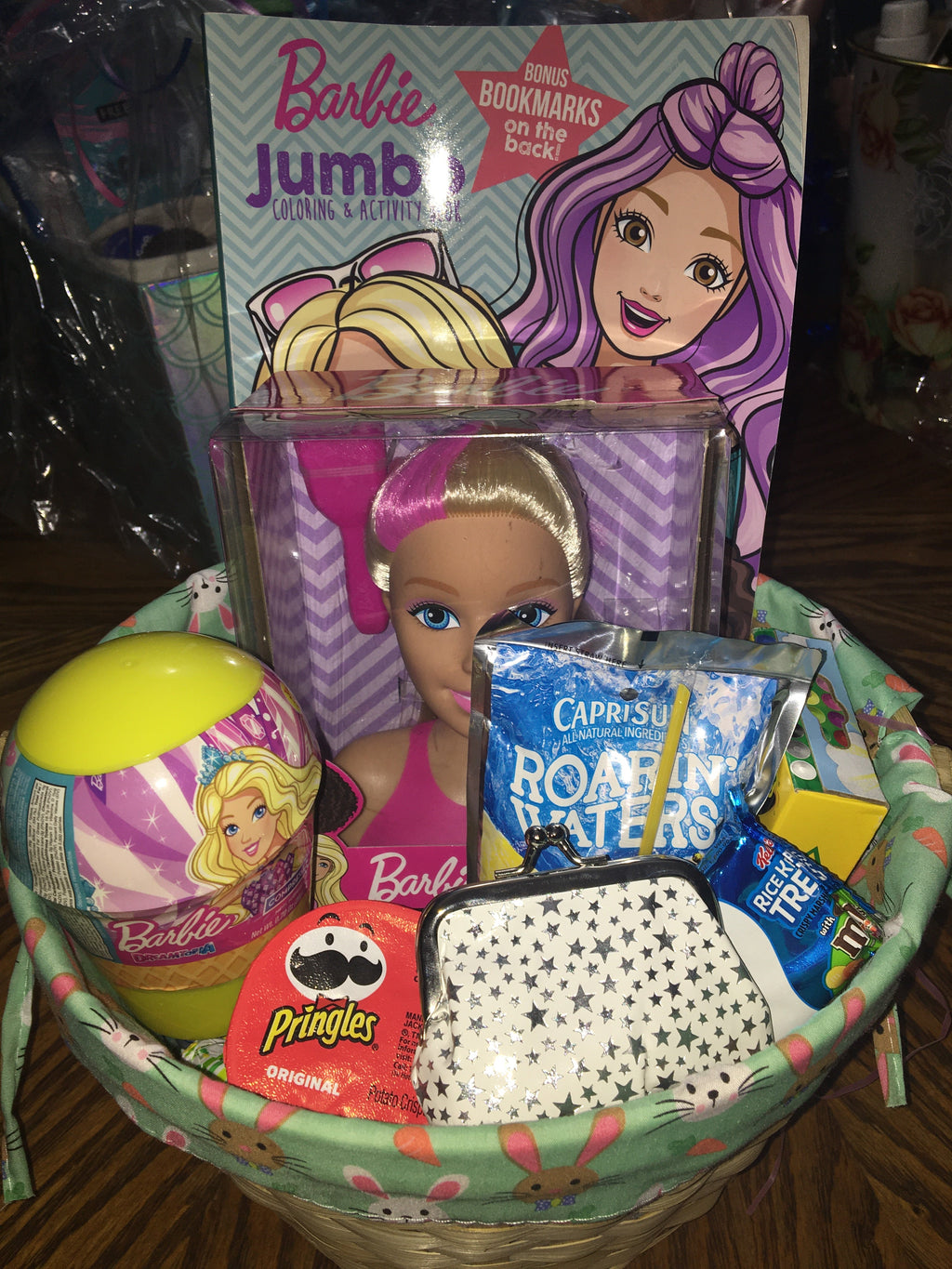Customized girls gift basket with toys, treats and fun items for kids.