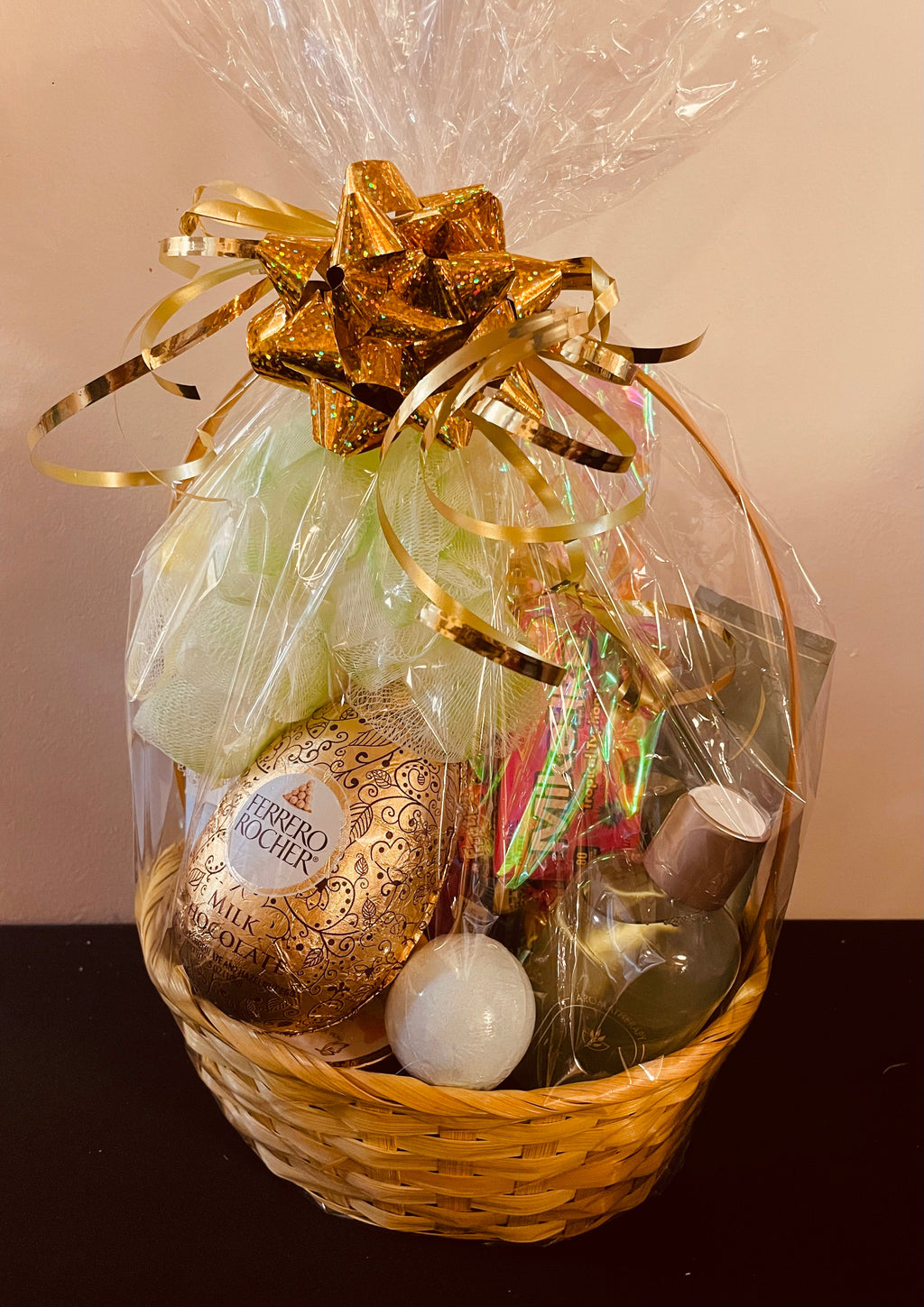 Customized miniature gift basket with assorted treats and goodies.