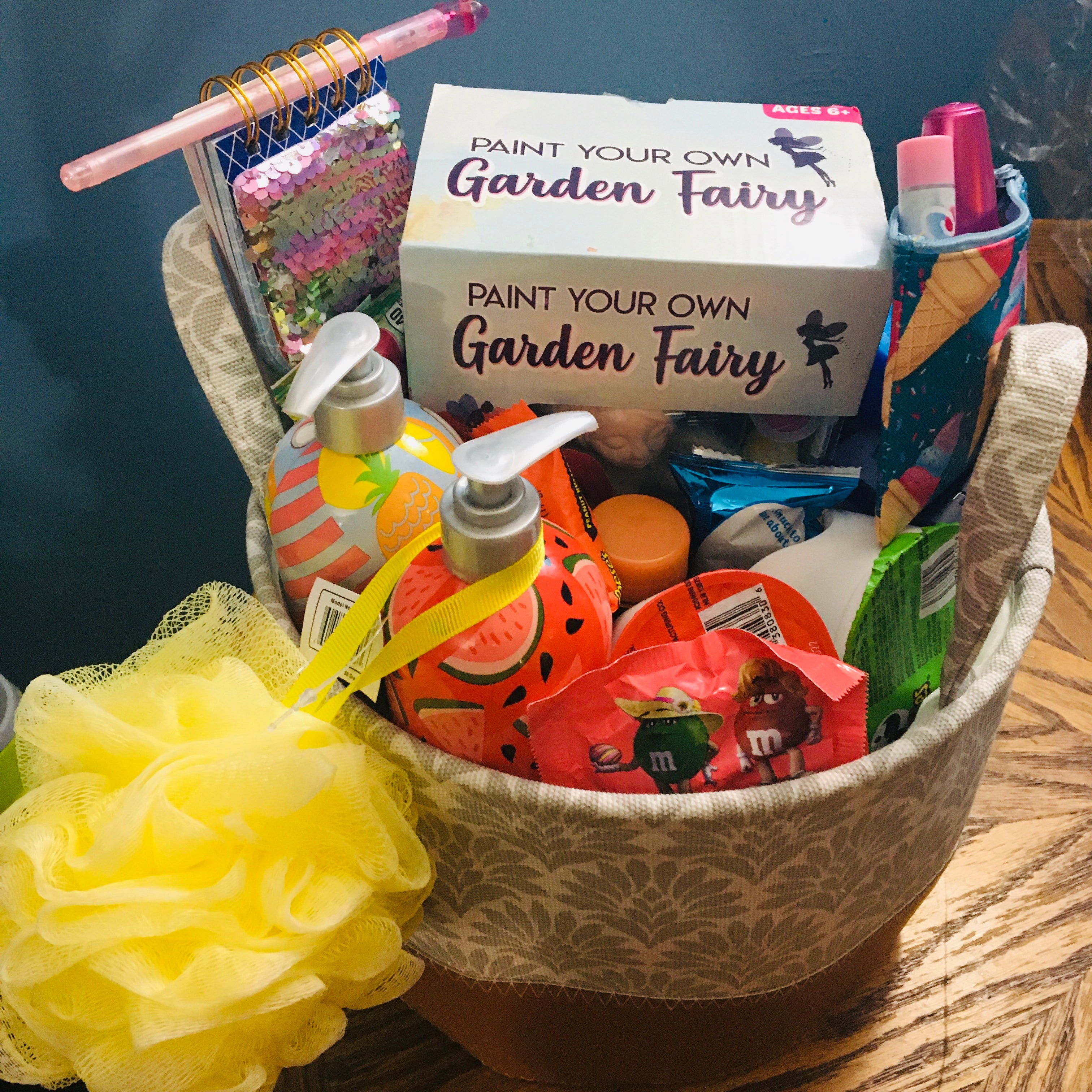 Customized medium gift basket for teenagers with fun and trendy items.