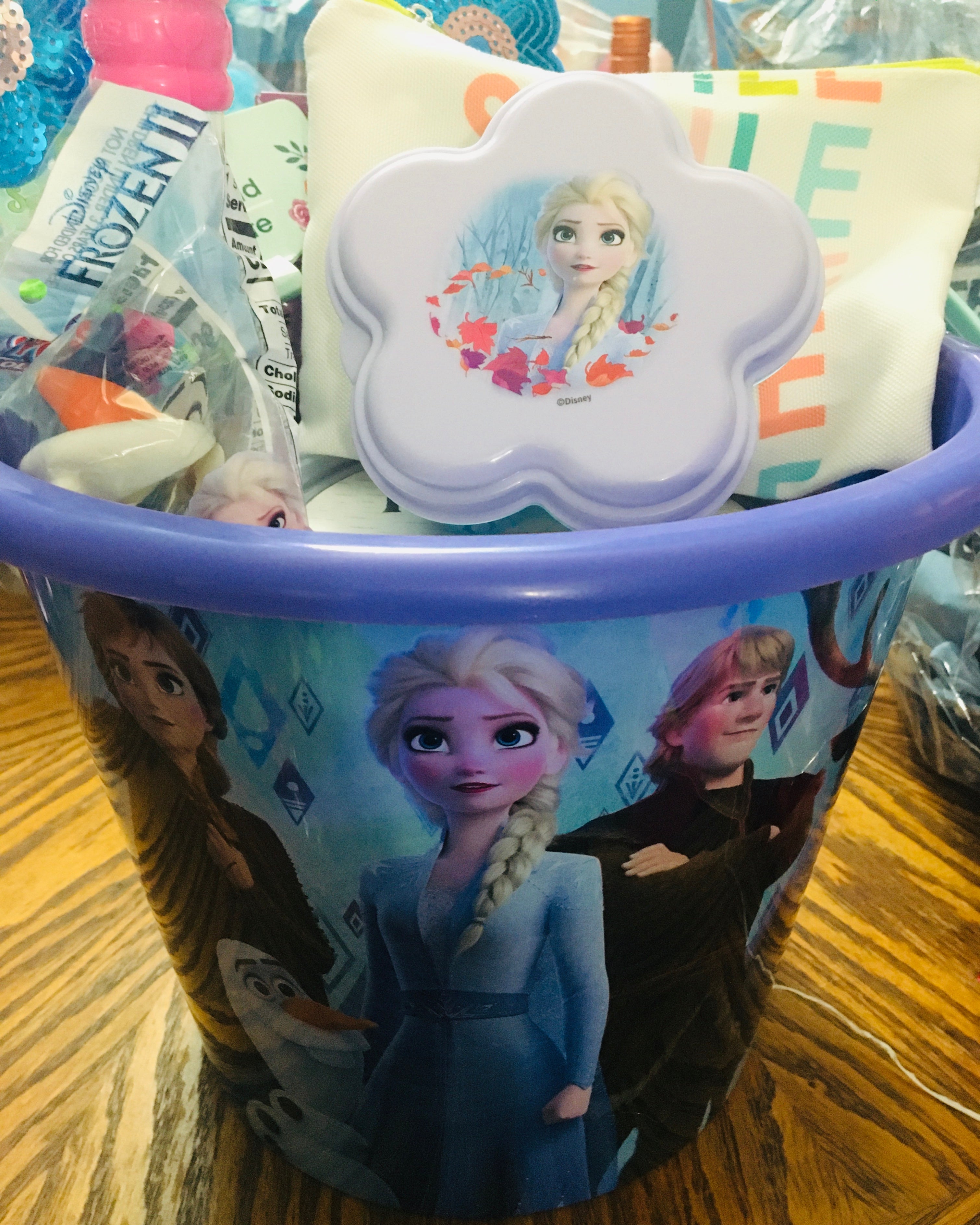 Customized girls gift basket with toys, treats and fun items for kids.