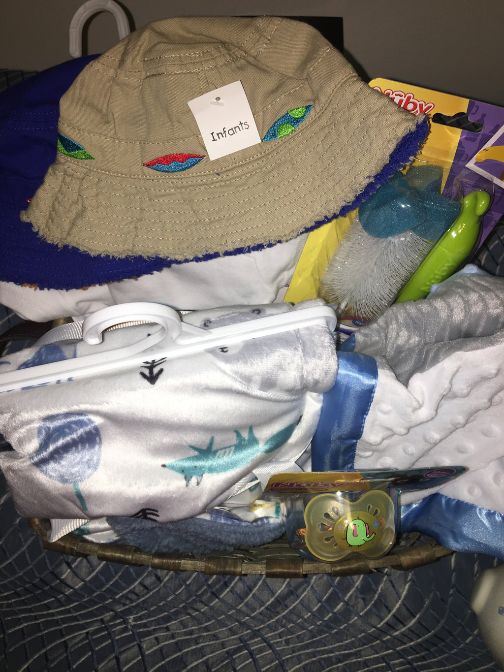Customized- to-order Baby shower gift basket for boys with toys and essentials.