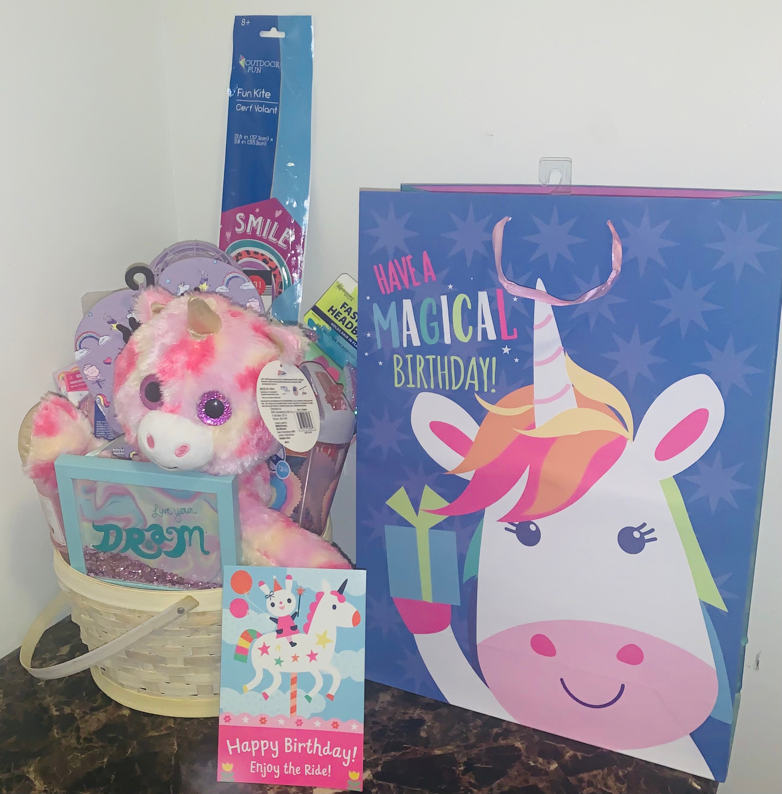 Customized girls gift basket with toys, treats and fun items for kids.